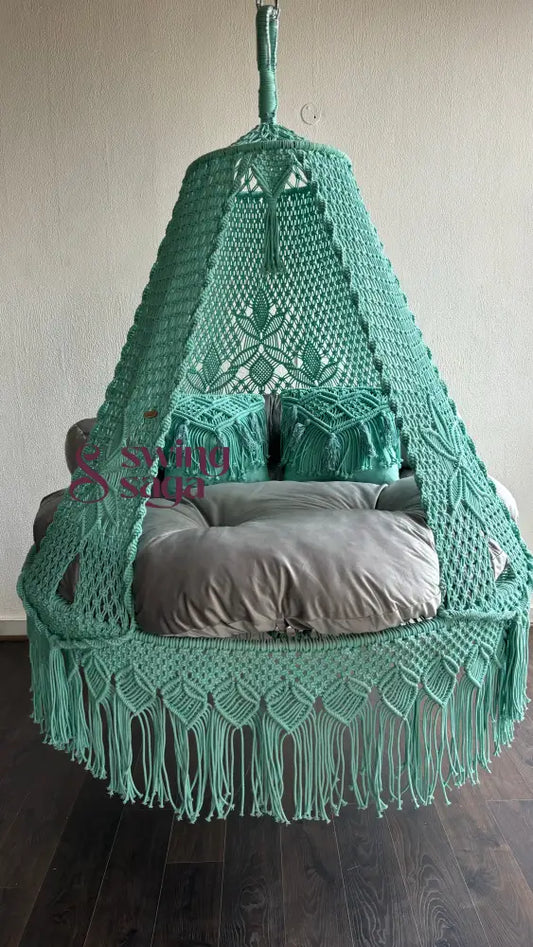 Handwoven cyan bed swing 60 inches round for indoor and outdoor use. comes with 2 macrame cushion and comfortable mattress.