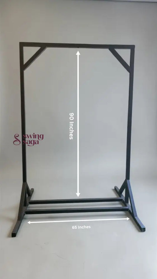 Black metal stand with measurements on a gray background
