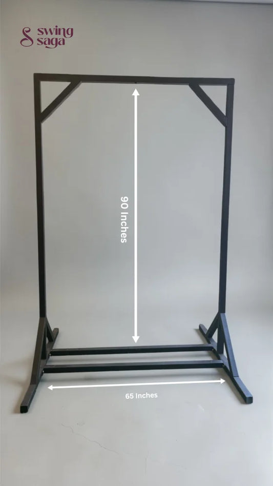 Black metal stand with measurements on a gray background