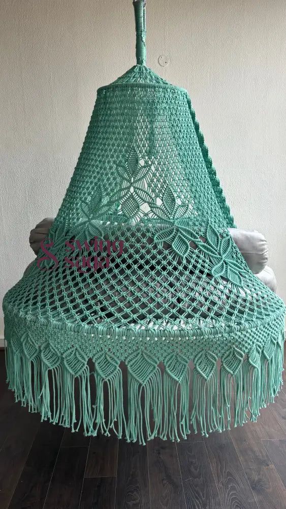 Back side vew of bed swing with flower patterns.