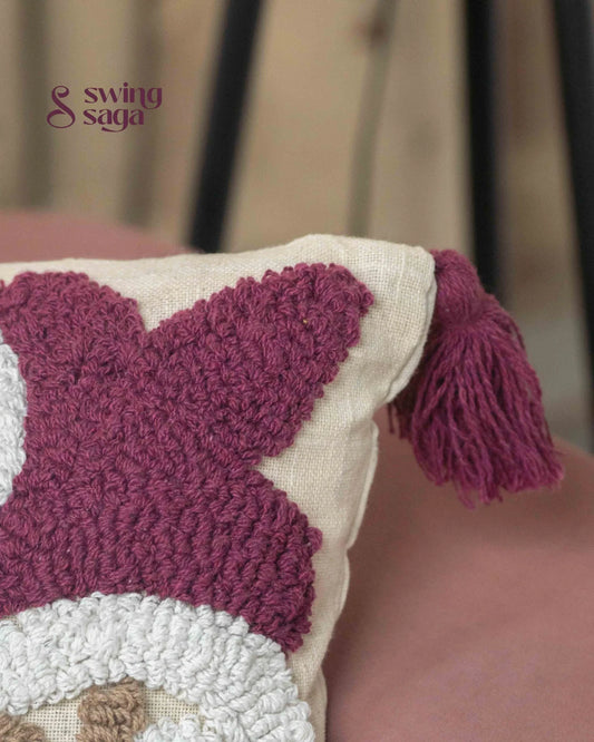 Close-up of cream and maroon patterned cushion fabric
