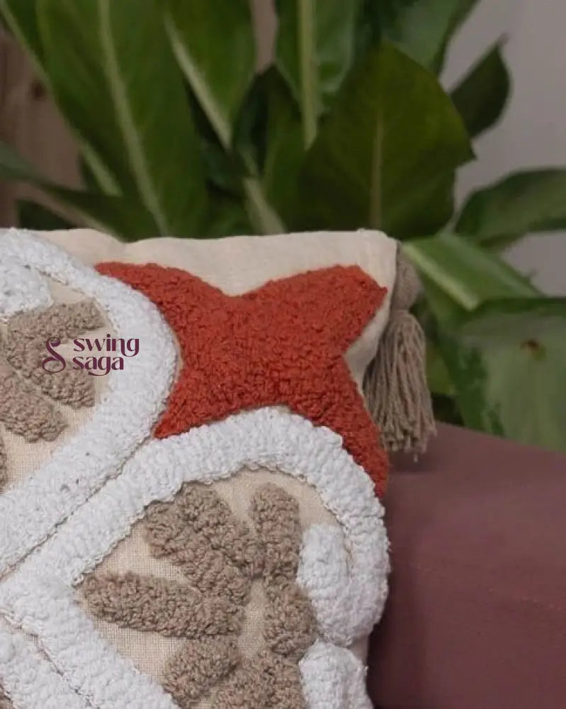 Cream and orange Tufted Pillow in square shape close up shot