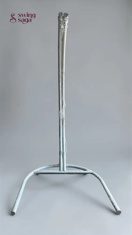 Silver candlestick holder on a gray background