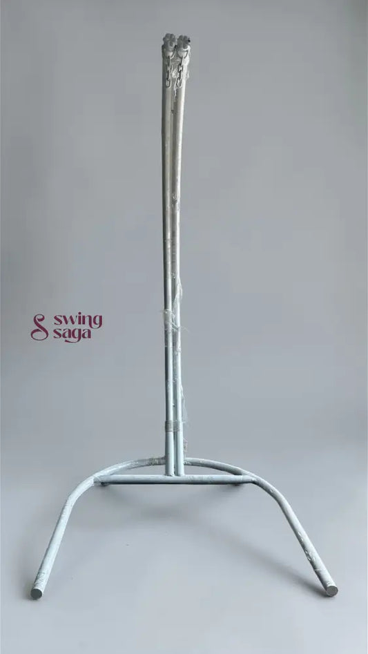 Silver candlestick holder on a gray background