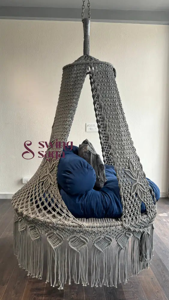 Angled side view of hanging hammock for two people. ideal for balcony and garden area