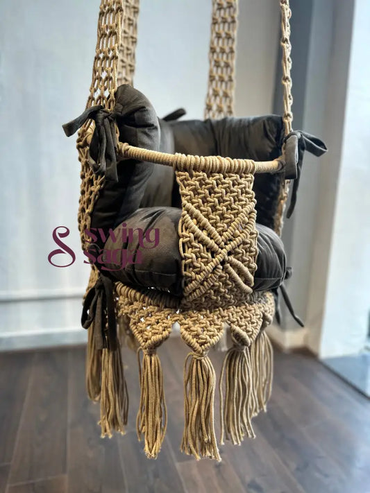 image of beige color handcrafted macrame swing front view the swing has one backrest support and one mattress.
