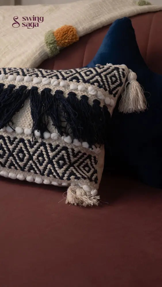 Decorative pillow with tassels on a couch