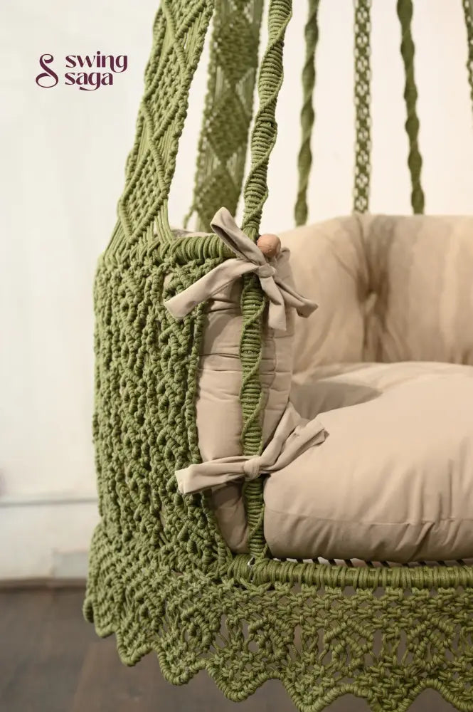 Chair hammock in green color.