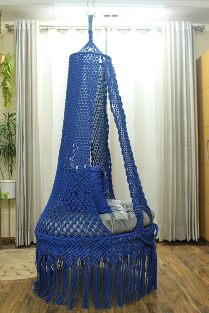 macrame hanging chair swing in blue color.