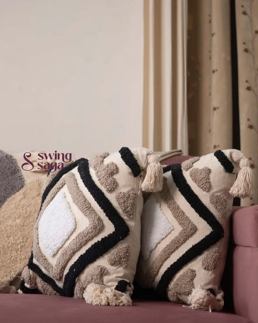 pair of square sofa cushions in white color with black tufted print