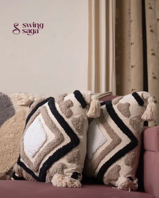 pair of square sofa cushions in white color with black tufted print