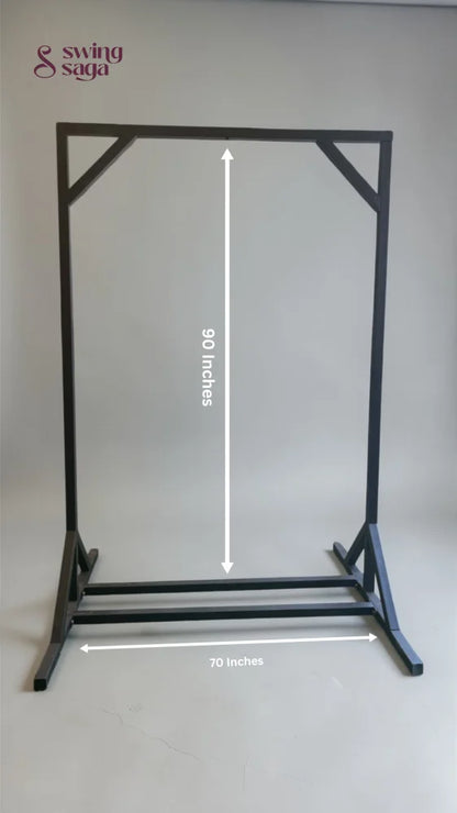 Black metal stand with measurements on a gray background