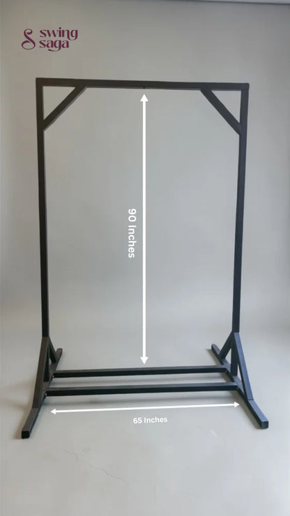 Black metal stand with measurements on a gray background