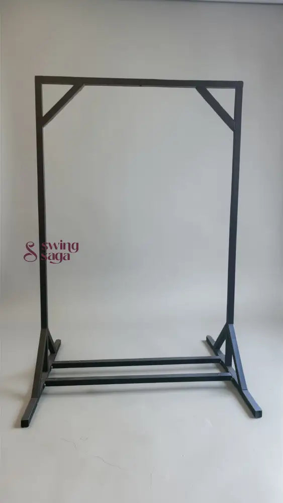 Black metal garment rack on a white background