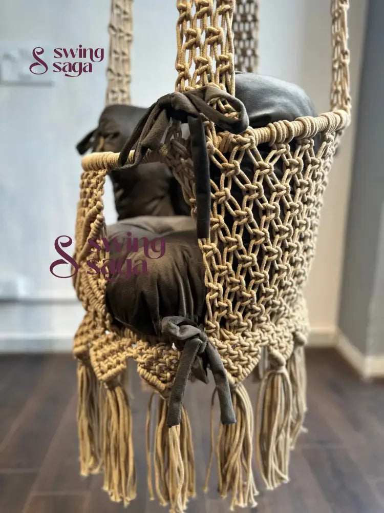 handcrafted baby swing with beads on the back and front for your baby's comfortable seating.