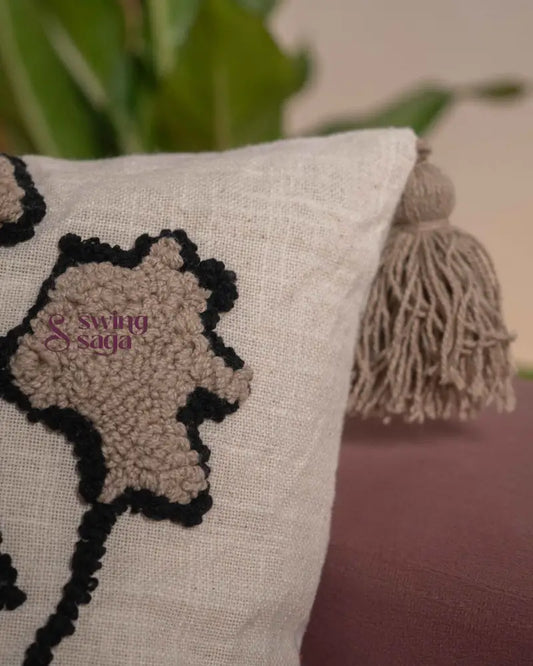close up shot of a cream colored cushion.