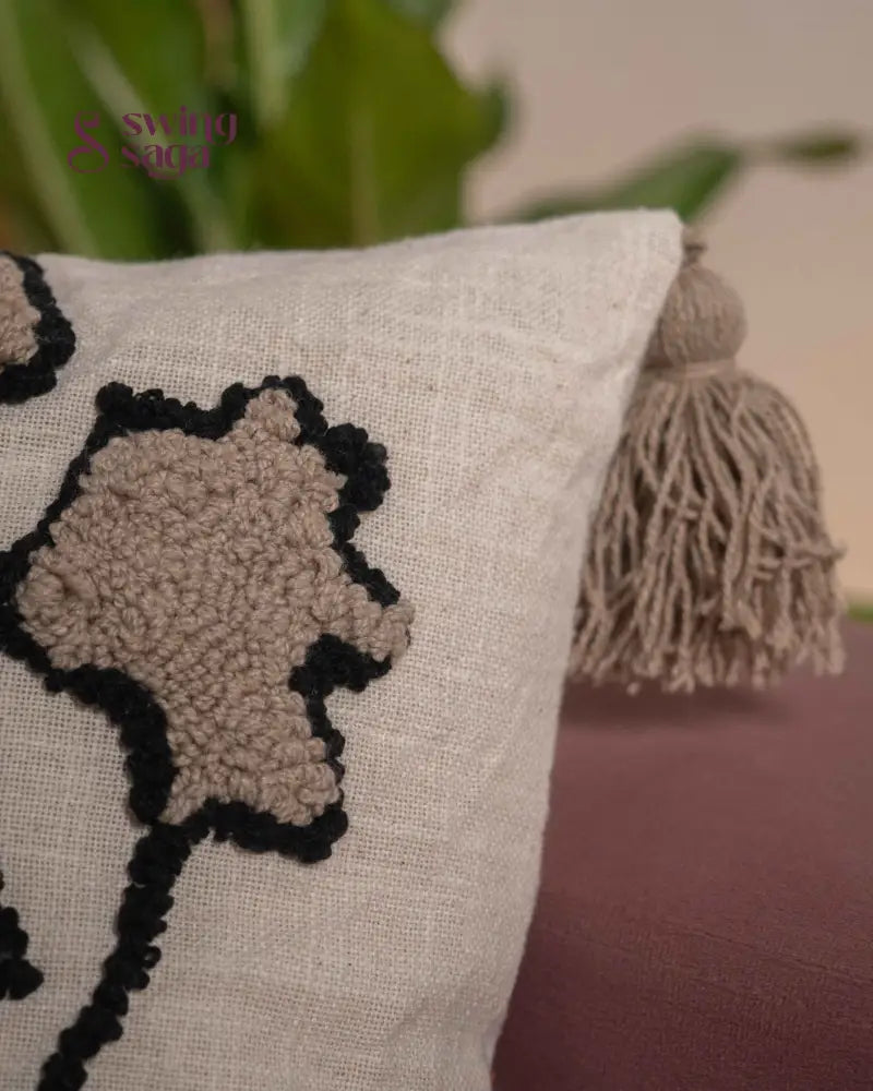 close up shot of a cream colored cushion.