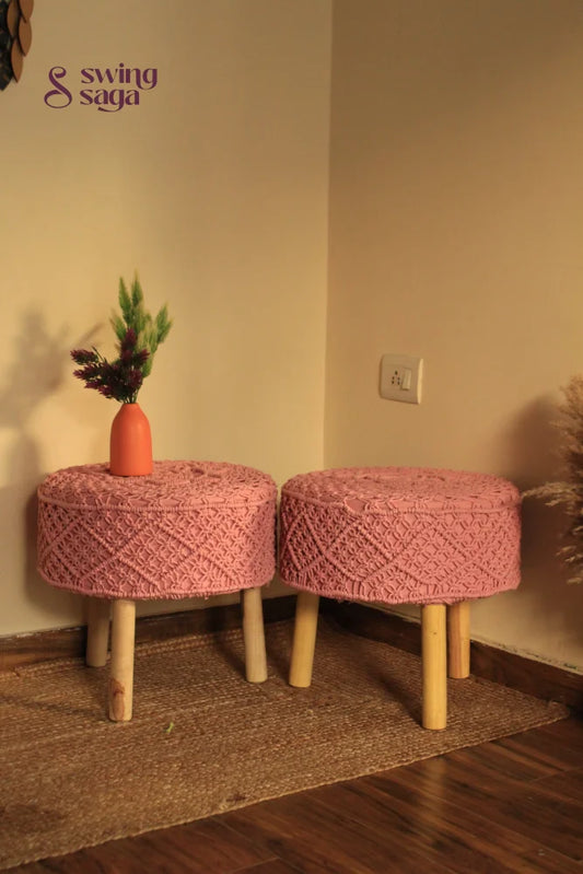 Baby pink macrame handwoven ottoman with wooden legs.