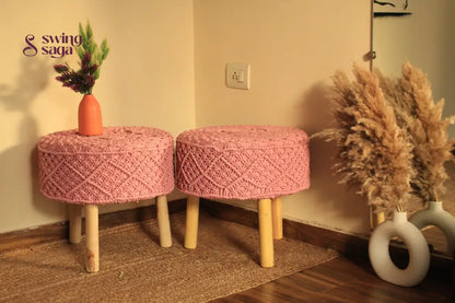 Baby pink macrame handwoven ottoman with wooden legs.