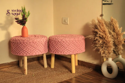 Baby pink macrame handwoven ottoman with wooden legs.