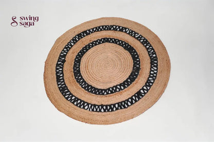 Round woven mat with black border on a white background