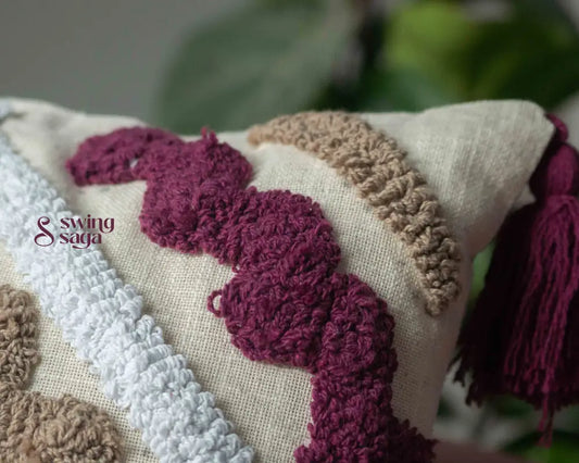 close up of a cushion in burgundy color.