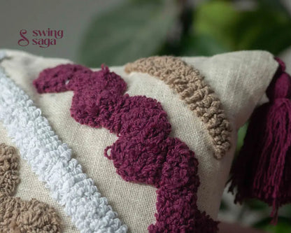 close up of a cushion in burgundy color.