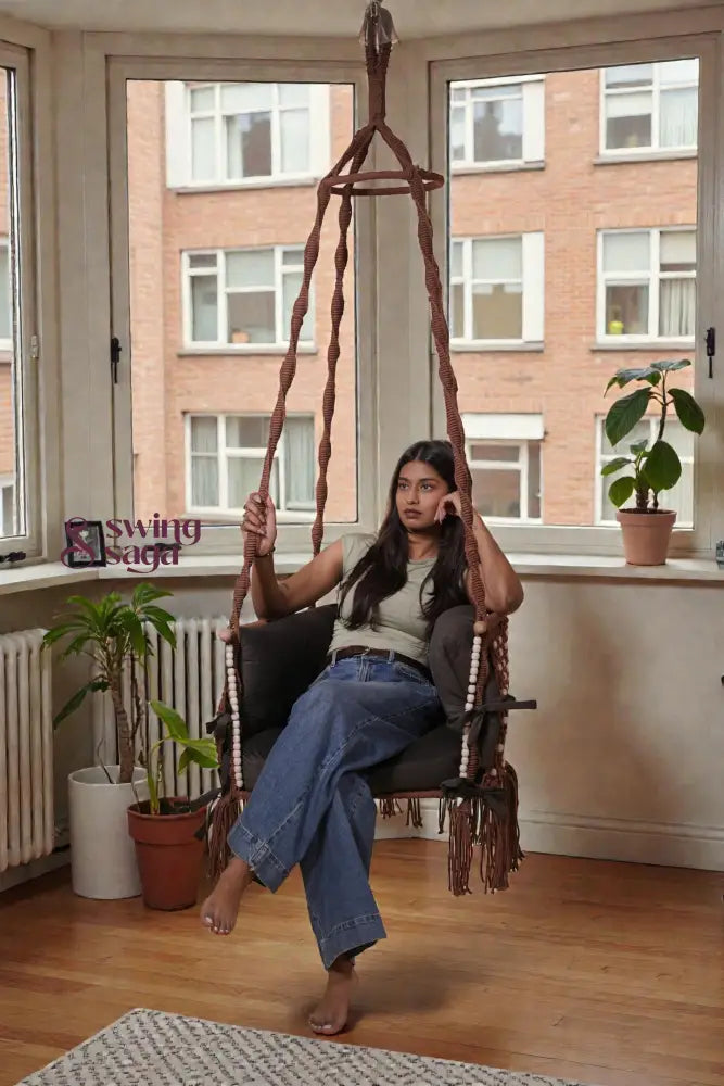 Brown single seater hanging chair