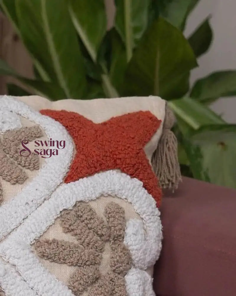 Cream and orange Tufted Pillow  in square shape close up shot 