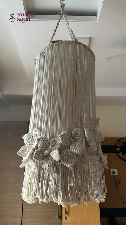 Elegant cream macrame chandelier featuring floral detailing and a ring style top hanger