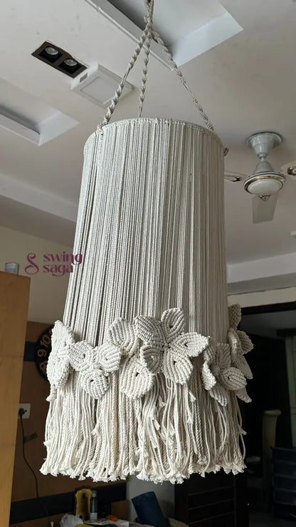 Creame macrame handcrafted chandelier with floral accents attached with a top hanging ring