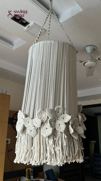 Creame macrame handcrafted chandelier with floral accents attached with a top hanging ring