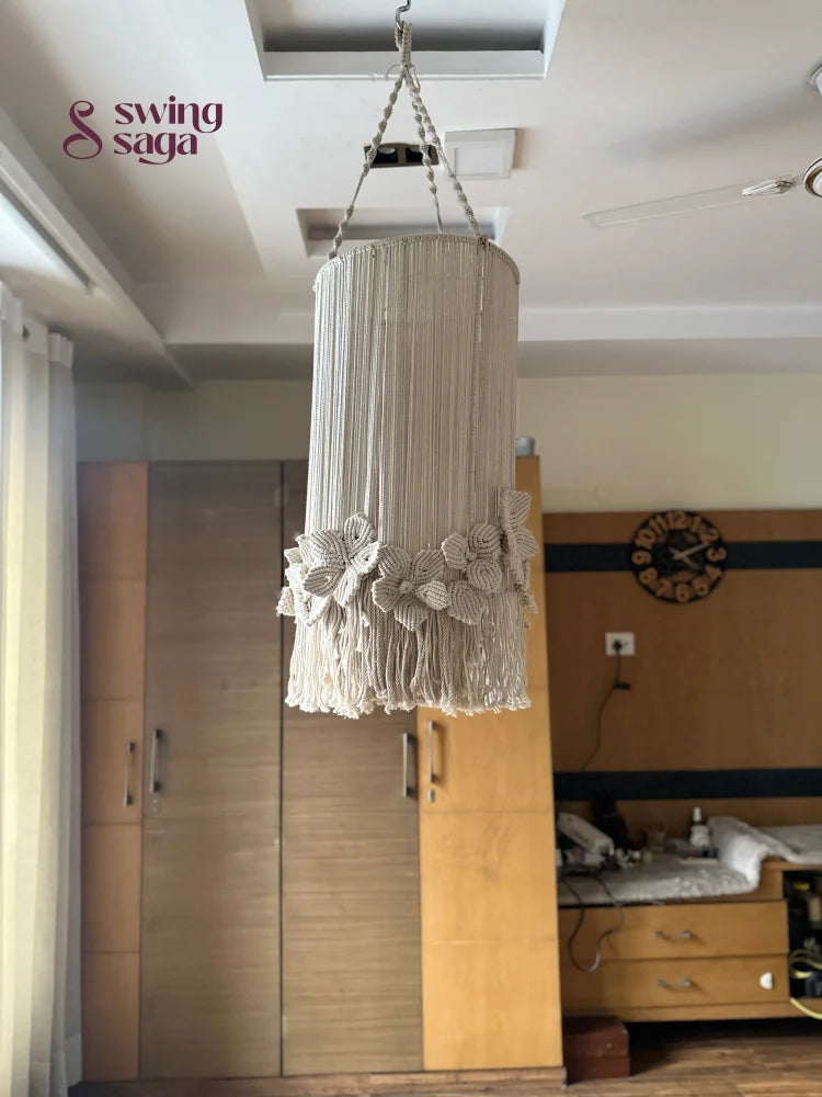 Stylish cream macrame chandelier in cream color with delicate flowers and a circular hanging ring