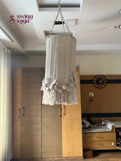 Stylish cream macrame chandelier in cream color with delicate flowers and a circular hanging ring
