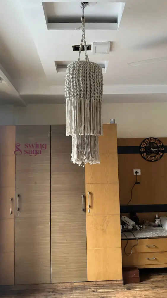 Macrame hanging chandelier light with layered tassels , bohemian ceiling decor for modern home interiors