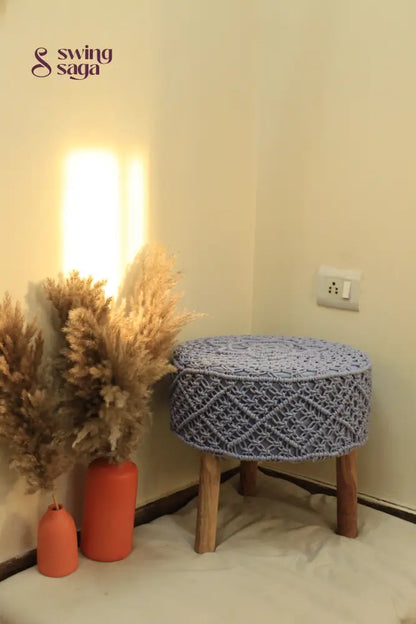 Light blue macrame handwoven ottoman.