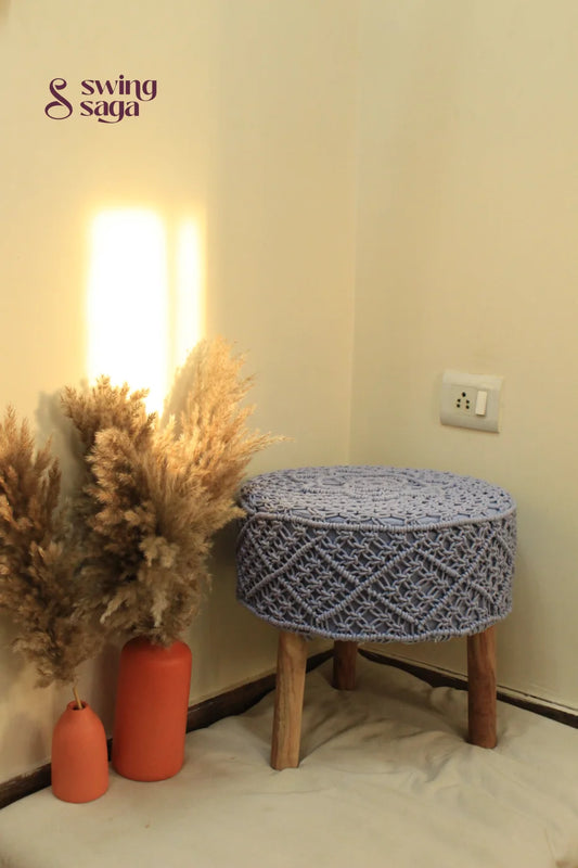 Light blue macrame handwoven ottoman.