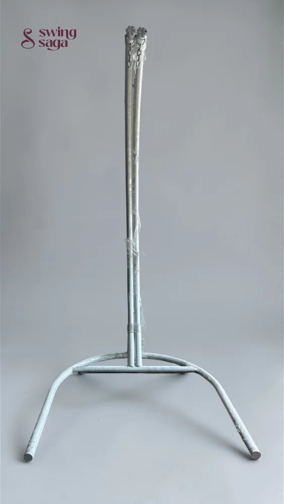 Silver candlestick holder on a gray background