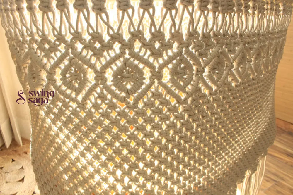 detailed image of Natural cotton macrame hanging swing chair with tassels – stylish indoor boho swing for home décor


