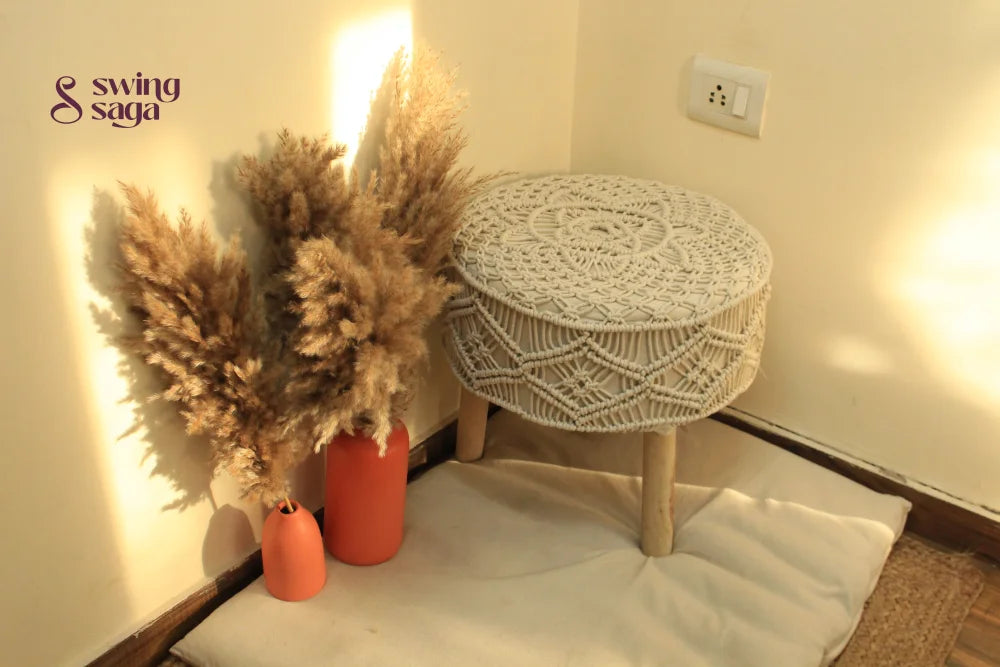 white macrame handcrafted ottoman with  terracotta vases