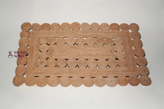 Rectangular doormat with a wicker pattern on a white background