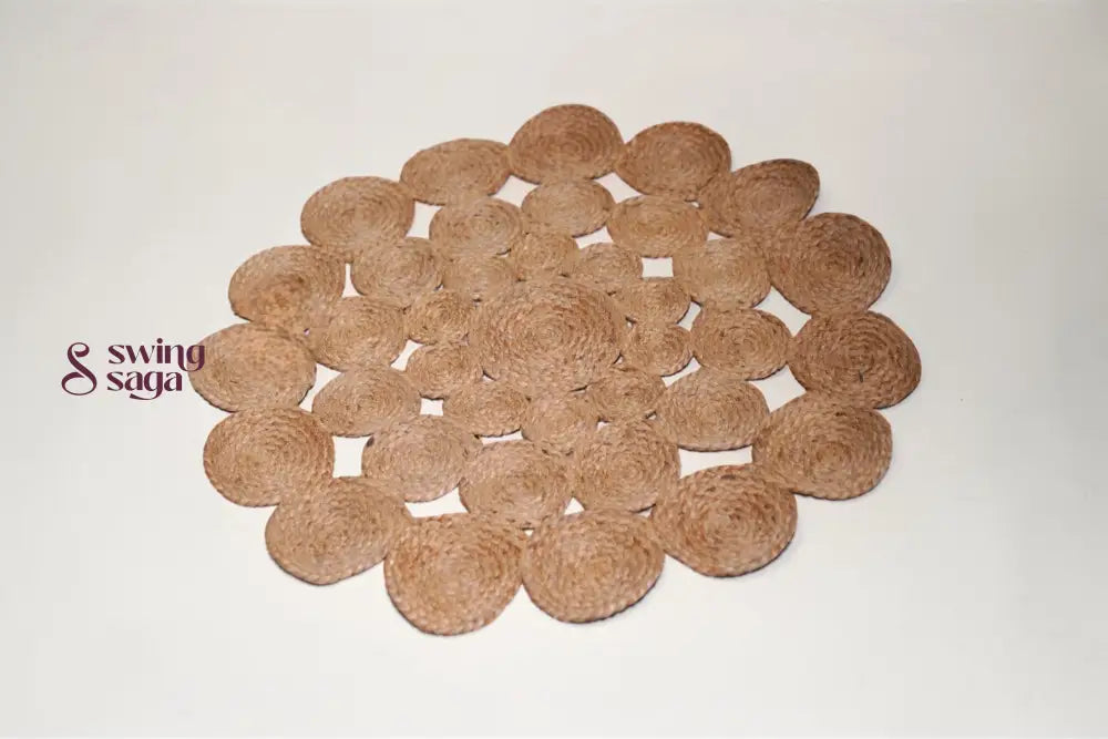 Round brown mat with cut-out patterns on a white background