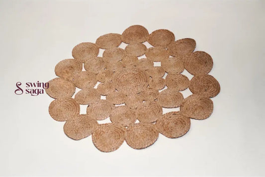 Round brown mat with cut-out patterns on a white background
