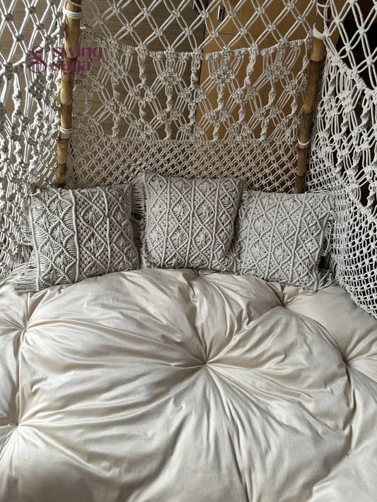 Close up shot of a white macrame teepee.