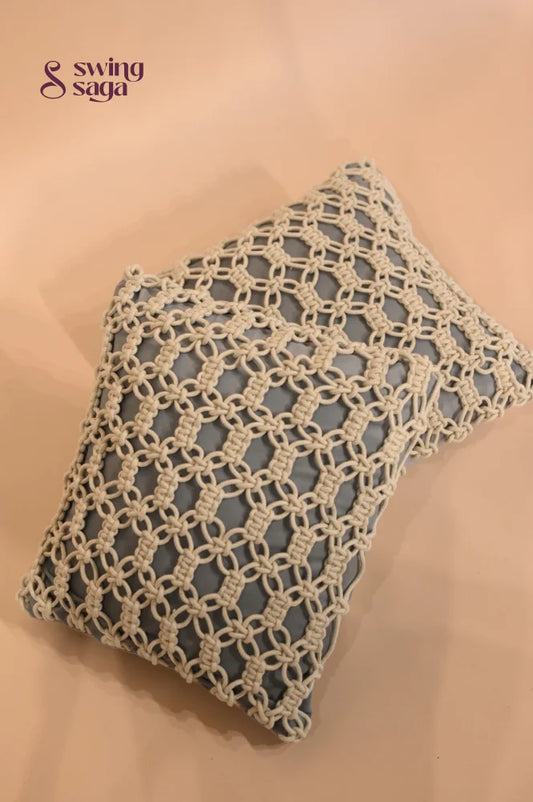 Decorative pillow with a geometric pattern on a beige background
