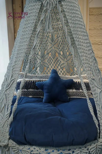 Blue cushion on a textured surface