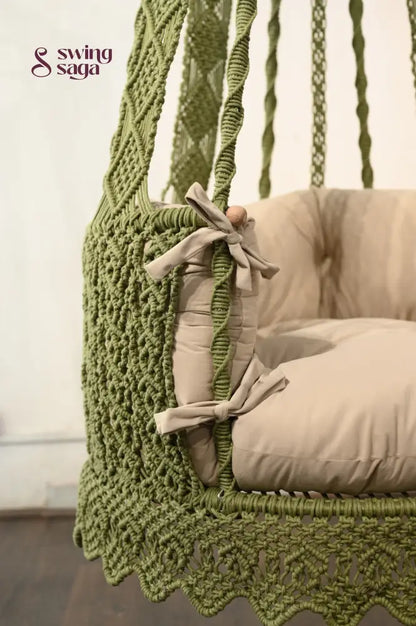 Chair hammock in green color.