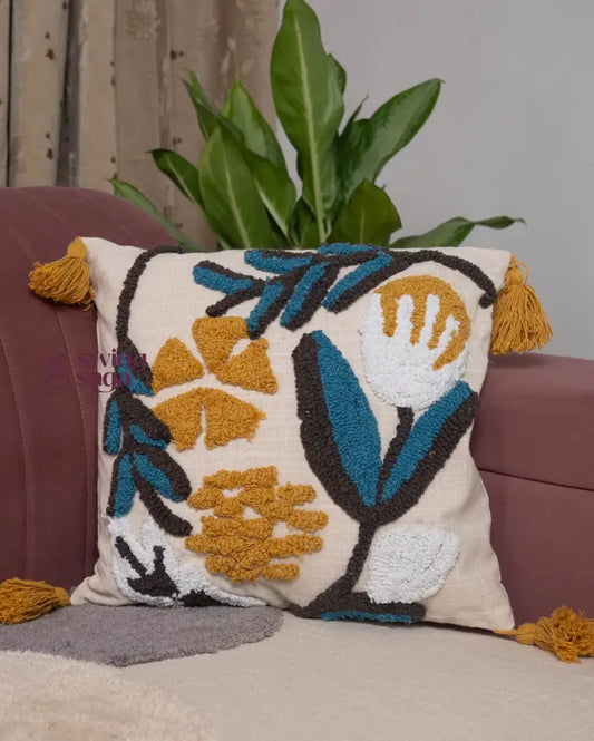 Square white embossed cushion cover with yellow and blue pattern, stylish sofa pillow for modern home décor