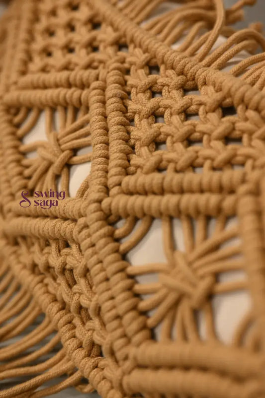 Close-up of woven brown mat with intricate pattern