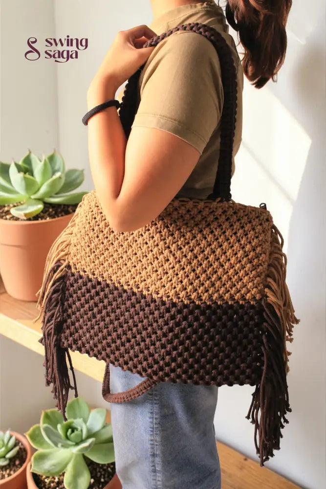 The Everyday Tote bag in beige and brown color for women.